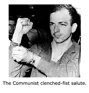 Oswald gives the clenched-fist salute